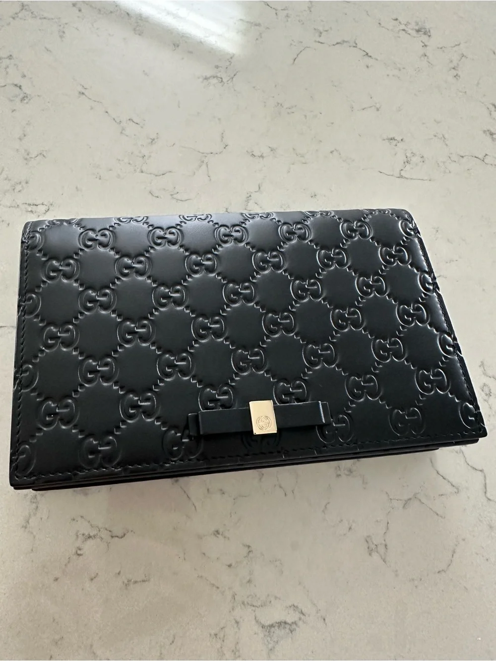 Authentic Gucci Black Embossed Leather Chain Wallet with Bow Accent